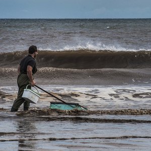 Sutton-on-sea Aug 2015~2 - dredge netting by hand for shell fish.jpg