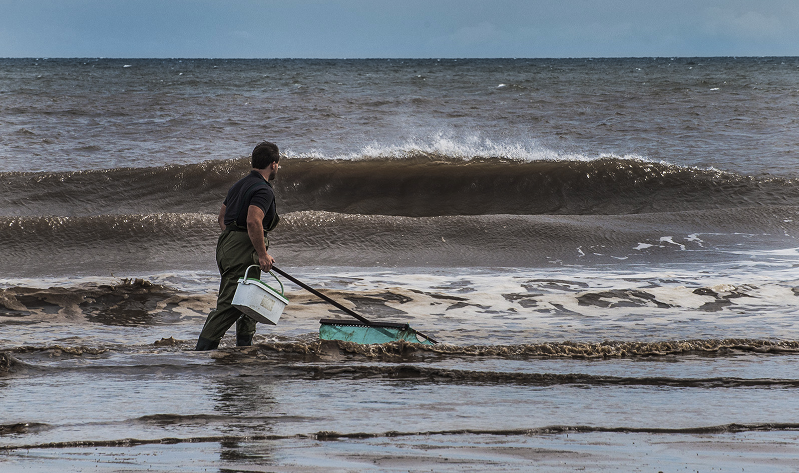 Sutton-on-sea Aug 2015~2 - dredge netting by hand for shell fish.jpg